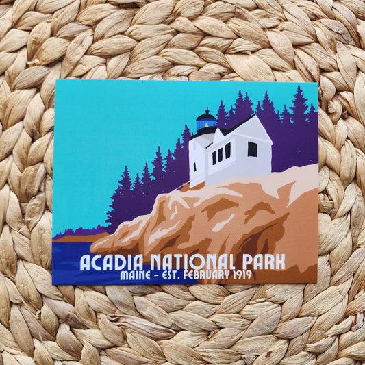 Postcard of Acadia National Park with a lighthouse on a woven surface