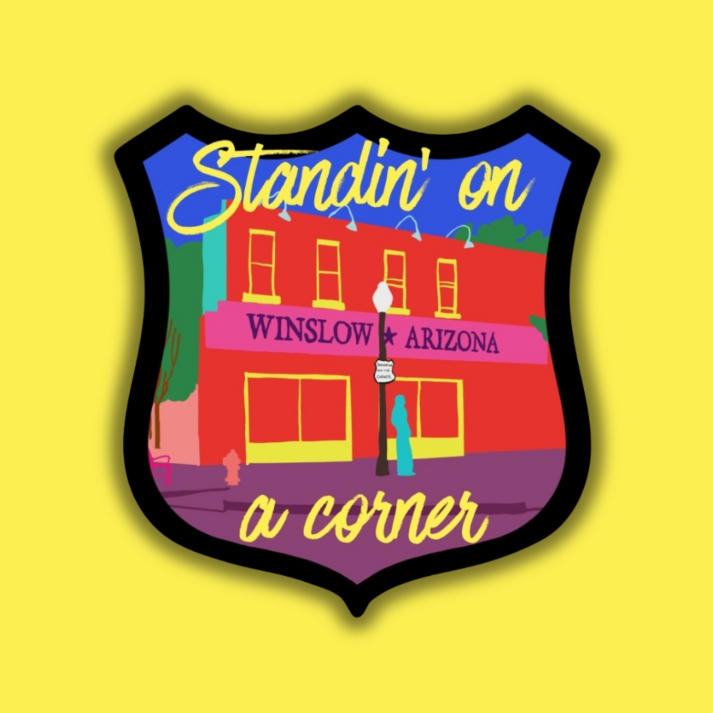 Colorful badge with 'Winslow, Arizona' and 'Standin' on a corner' text on a yellow background