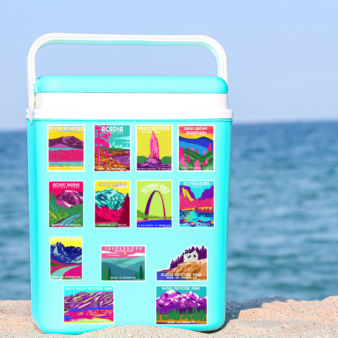 Cooler with national park stickers covering it. 